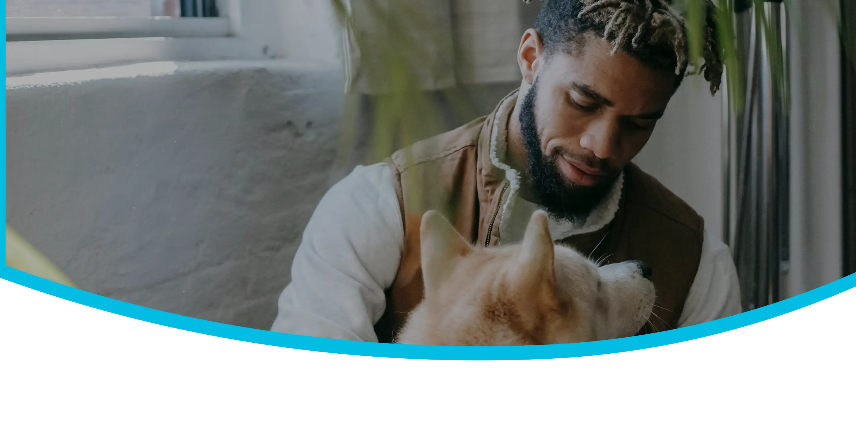 A man looks at his dog